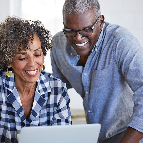 Couple using computer together